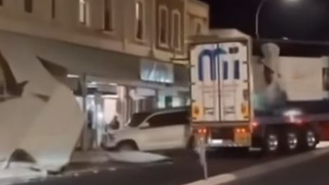 A truck has been captured scraping into a building and two parked cars in the main street of Gawler late on Friday night. Picture: Facebook/Drillin’ Panagiotou