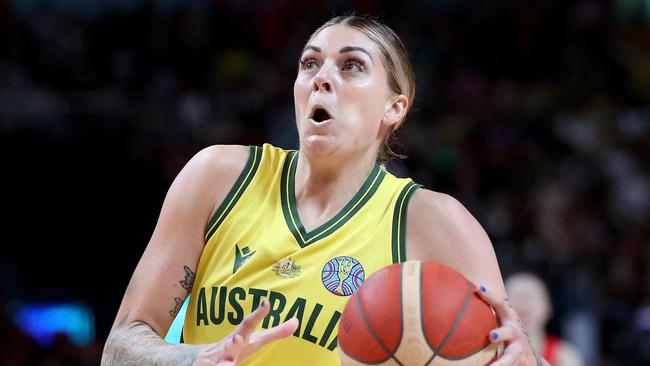 Australia's Cayla George drives to the basket .