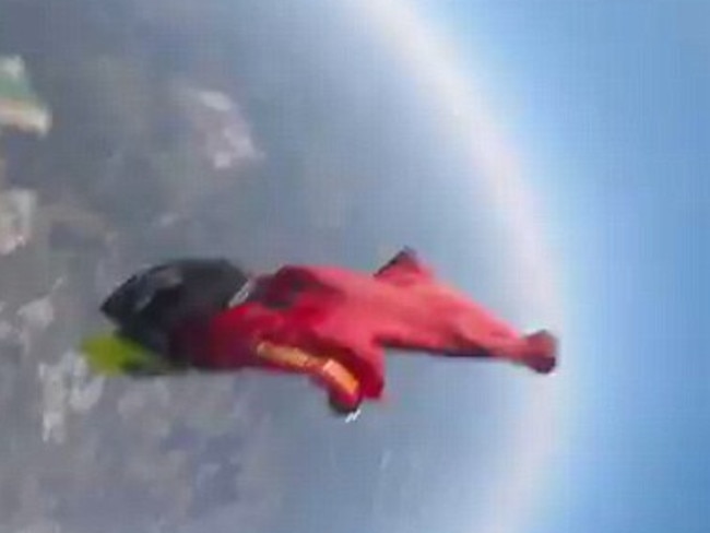 The moment of impact as the skydiver in red hits Sebastian Leal 14,000 feet above the ground. Picture: Sebastian Leal