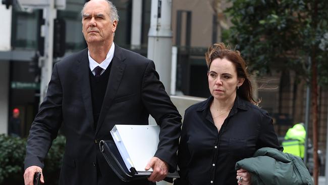 Rebecca Farrell arrives at Federal Court in Sydney with lawyer Michael Harmer. Picture: John Feder/The Australian.