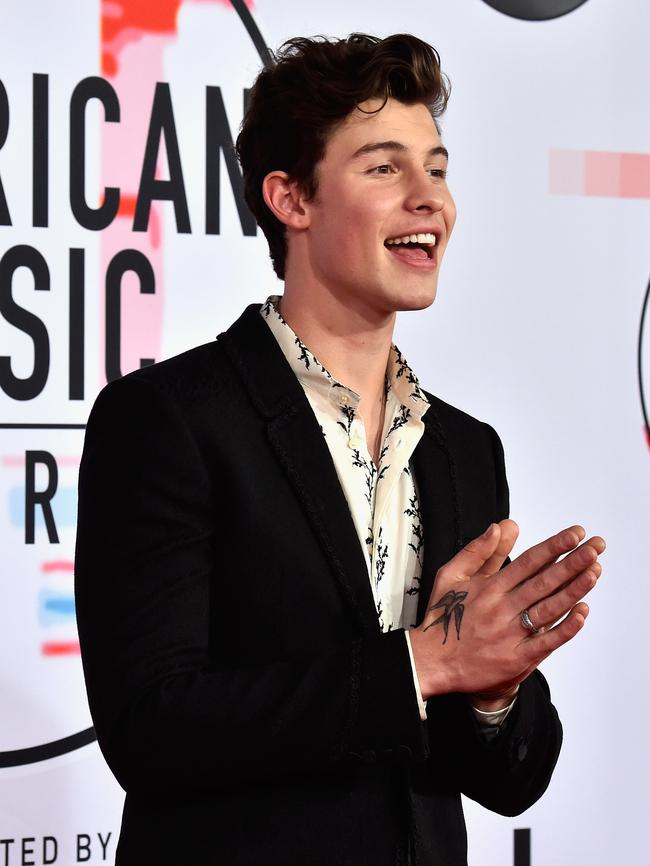 Shawn Mendes flashed a smile. Picture: Getty