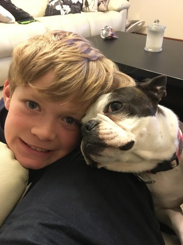 Jacqui and Samuel, 11, before the dog's theft. It has since been returned.