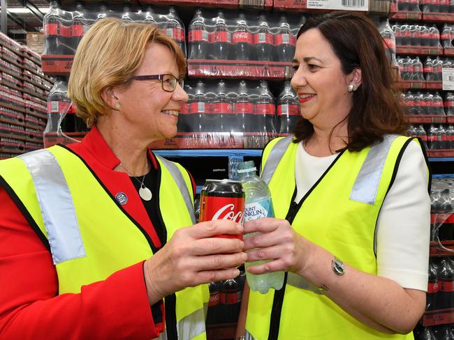 Group Managing Director of Coca-Cola Amatil Alison Watkins, left, and Queensland Premier Annastacia Palaszczuk toast the opening of Coca-Cola Amatil’s $165 million warehouse facility, in Brisbane, which in 2018, was the company’s largest in Australia. Picture: AAP Image/Darren England.