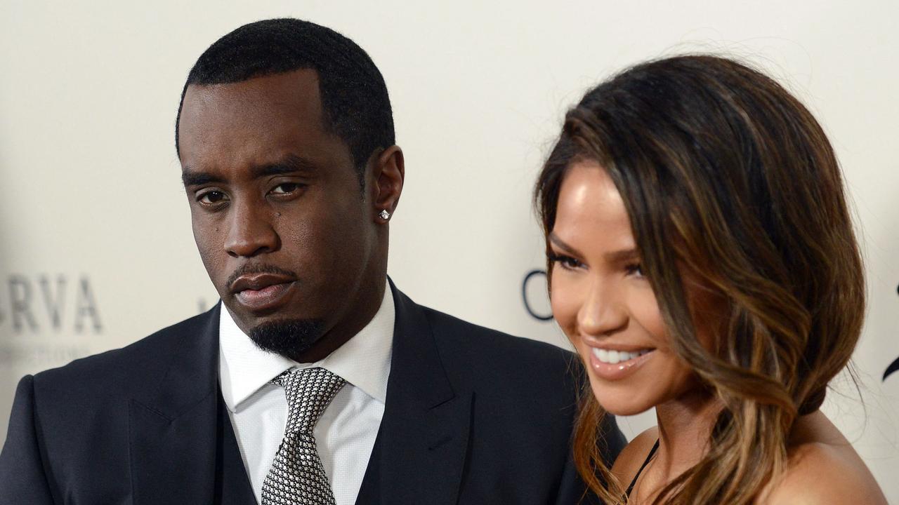 (FILES) Sean P. Diddy Combs and Cassie Ventura attend the premiere of 'The Perfect Match' at the Arclight Theatre in Los Angeles on March 7, 2016. Singer Cassie and rap mogul Sean Combs have reached a settlement "amicably" a day after she filed a lawsuit accusing him of rape and physical abuse, her lawyer said on November 18, 2023. The R&B singer, whose real name is Casandra Ventura, said in a suit filed on November 16, 2023, that hip-hop artist Combs subjected her to more than a decade of coercion by physical force and drugs as well as a 2018 rape. (Photo by Chris Delmas / AFP)