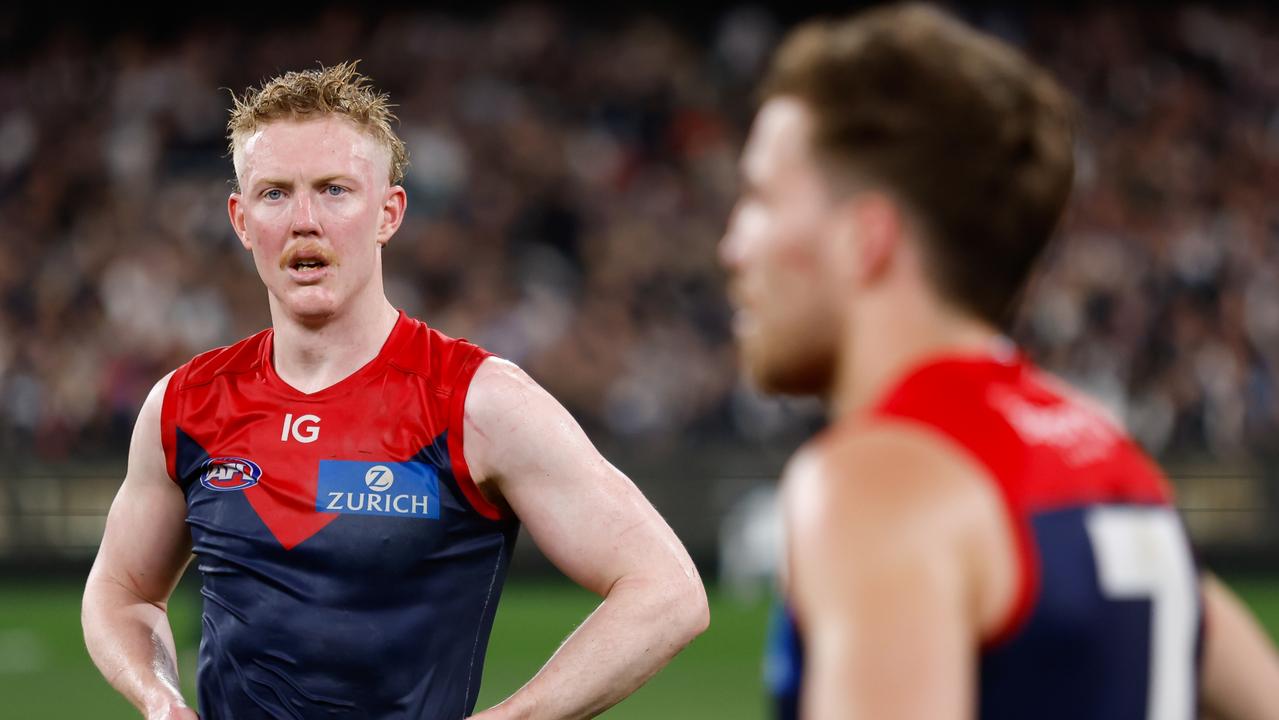 MELBOURNE, AUSTRALIA - SEPTEMBER 15: Clayton Oliver of the Demons looks dejected after a loss during the 2023 AFL First Semi Final match between the Melbourne Demons and the Carlton Blues at Melbourne Cricket Ground on September 15, 2023 in Melbourne, Australia. (Photo by Dylan Burns/AFL Photos via Getty Images)