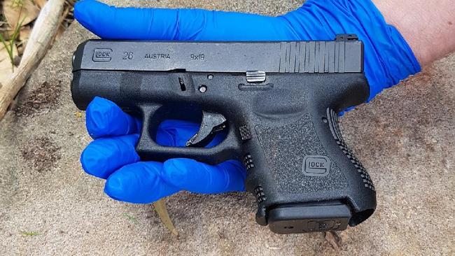 Police seized a Glock after a raid in Sydney’s south on Wednesday. Picture: NSW Police