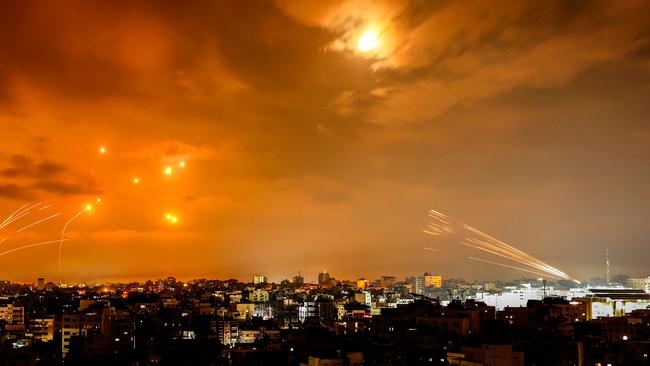 Rockets fired by Palestinian militants from Gaza City are intercepted by the Israeli Iron Dome defence missile system.