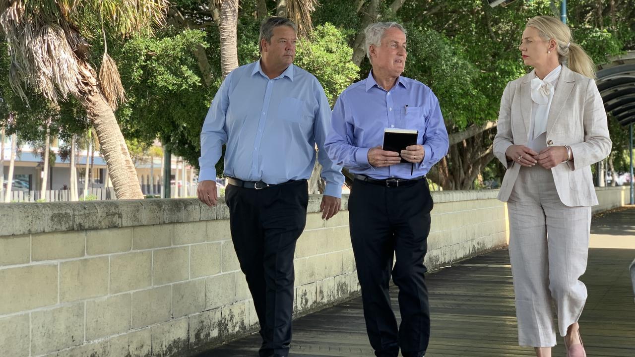 Dawson LNP candidate Andrew Willcox (left), Mackay Mayor Greg Williamson (centre) and Senator Bridget McKenzie talk resilience funding by the Pioneer River in Mackay on the eve of the 2022 federal election. Picture: Duncan Evans