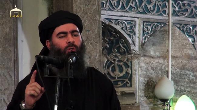 Abu Bakr al-Baghdadi, aka Caliph Ibrahim, addresses Muslim worshippers at a mosque in the militant-held northern Iraqi city of Mosul several years ago.