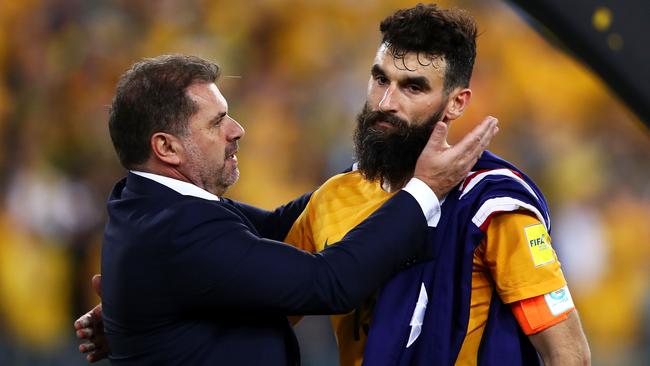 Ange Postecoglou and Mile Jedinak after Australia defeated Honduras. Picture: Getty Images