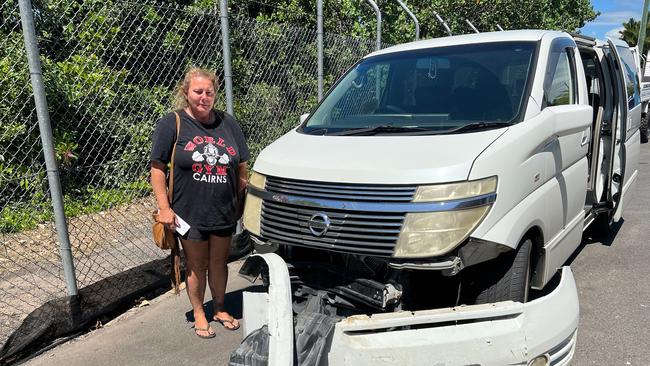 Bentley Park woman Natasha Baddock with her damaged mini van on Friday. Photo: Supplied.