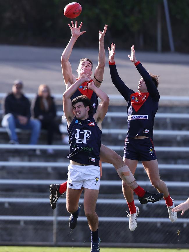 North Hobart's Hamish Allan marks over Launceston's Alec Wright. Picture: Zak Simmonds