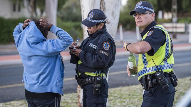 An Aboriginal woman is fined for drinking in a public place. Picture: Jason Edwards