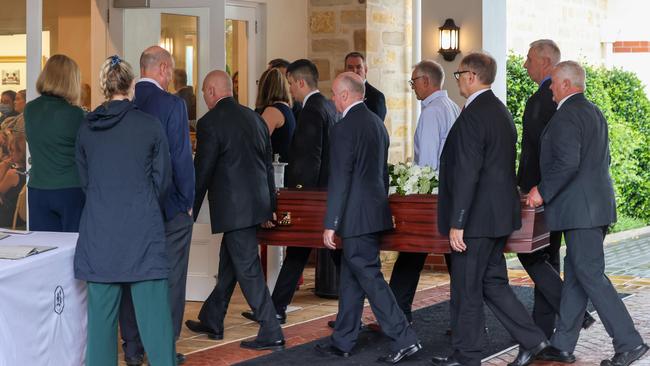 Mourners attend the funeral of slain pediatrician Dr Michael Yung at Berry’s Funeral Home on Magill Rd in Norwood. Picture: Russell Millard