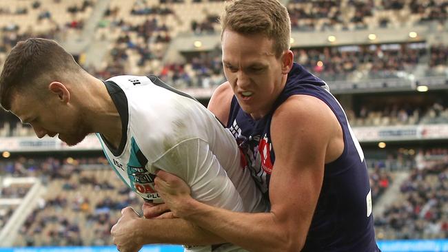 Ryan Nyhuis tackles Robbie Gray. Pic: Getty Images