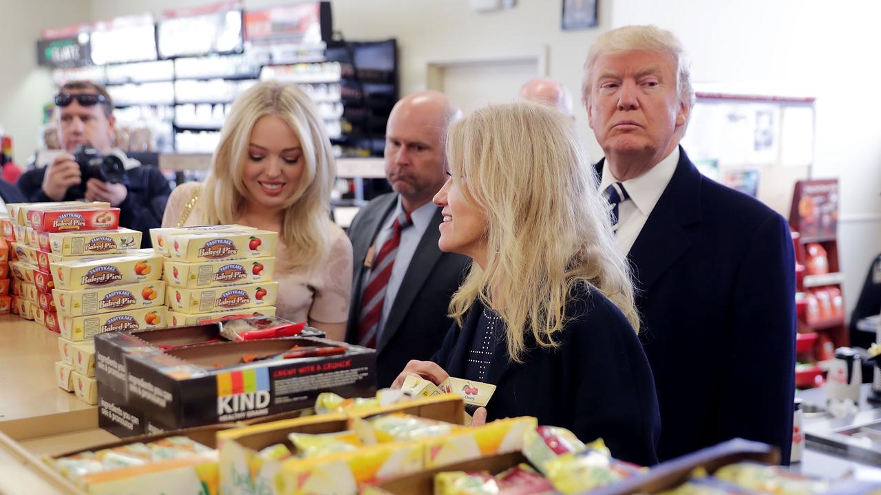 Republican presidential nominee Donald Trump, his daughter Tiffany, and campaign manager Kellyanne Conway, shop for snack food at a Wawa gas station in Valley Forge, Pennsylvania, while on the campaign trail in 2016. Picture: AFP