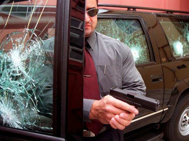 Luigi Trunzo in 2000, promoting a car built to withstand machine gun fire. Picture: The Daily Telegraph