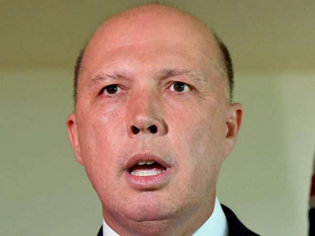 Peter Dutton, Federal Minister for Home Affairs is seen during a press conference in Brisbane, Wednesday, January 2, 2019. Minister Dutton spoke to the media about the citizenship status of the terrorist Neil Prakash. (AAP Image/Darren England) NO ARCHIVING