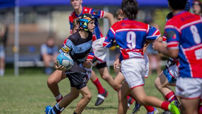 Under-14 and Under-15 finals of the King of the Country rugby union tournament at Gold Coast Eagles Rugby Union Club on Sunday 10 April 2022. Under 14's playing for 3rd place, Bond Pirates (Red) vs Maroochydore Swans. Picture: Jerad Williams