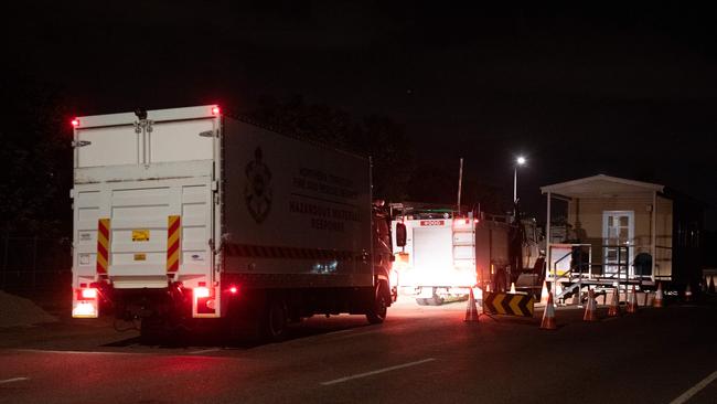 Emergency service vehicles arrive at the Darwin Correctional Facility after prisoners were reported on the roof after a mass breakout. Picture: Che Chorley