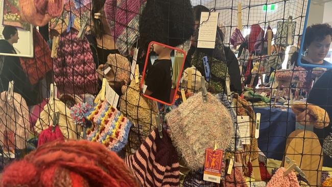 Crowds check out the beanies on display at the 2023 Alice Springs Beanie Festival. Picture: Laura Hooper.