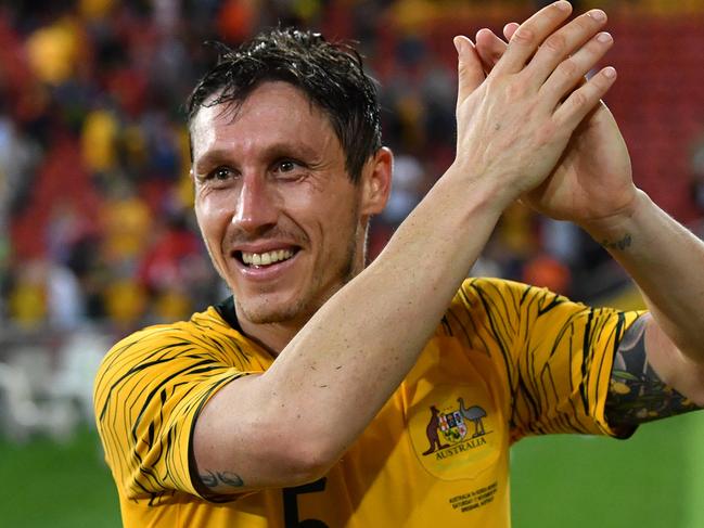 Mark Milligan of the Socceroos is seen reacting at the end of the International friendly match between Australia and the Korea Republic at Suncorp Stadium, in Brisbane, Saturday, November 17, 2018. (AAP Image/Darren England) NO ARCHIVING, EDITORIAL USE ONLY