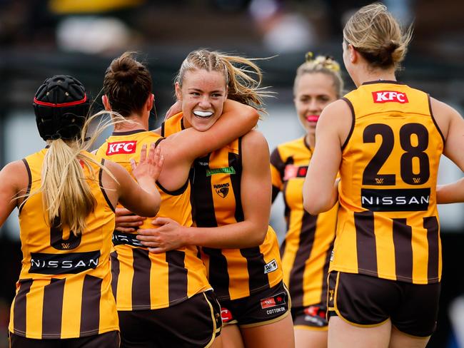 Bridie Hipwell of the Hawks celebrates a goal with teammates. Picture: Getty Images