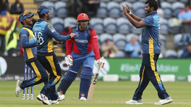 Sri Lanka's Thisara Perera celebrates after dismissing Afghanistan's Mohammad Nabi.