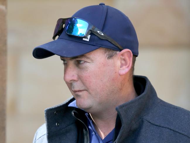 Alexander Gill leaves the Magistrates court in Adelaide, Tuesday, October 15, 2019. Gill faced court charged with causing death by dangerous driving over a boating accident on the River Murray at Swan Reach. (AAP Image/Kelly Barnes) NO ARCHIVING