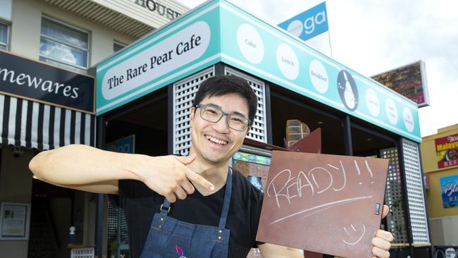 Frank Lau outside The Rare Pear Cafe in Holland Park West. Picture: Renae Droop