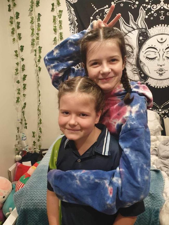 Mieka Pokarier, 16, who died, with her 10-year-old sister Freya, who is fighting for her life.