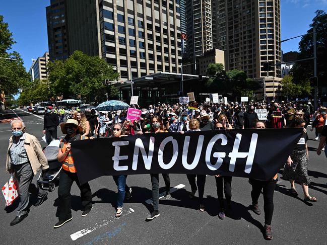 CORRECTION / Protesters attend a rally against sexual violence and gender inequality in Sydney on March 15, 2021. (Photo by Steven Saphore / AFP) / âThe erroneous mention[s] appearing in the metadata of this photo by Steven Saphore has been modified in AFP systems in the following manner: [Sydney] instead of [Canberra]. Please immediately remove the erroneous mention[s] from all your online services and delete it (them) from your servers. If you have been authorized by AFP to distribute it (them) to third parties, please ensure that the same actions are carried out by them. Failure to promptly comply with these instructions will entail liability on your part for any continued or post notification usage. Therefore we thank you very much for all your attention and prompt action. We are sorry for the inconvenience this notification may cause and remain at your disposal for any further information you may require.â