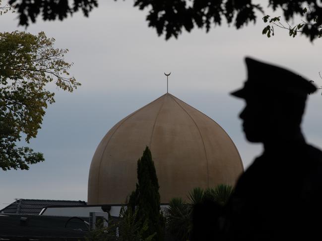 CHRISTCHURCH, NEW ZEALAND - MARCH 18: A police officer stands guard near Al Noor mosque on March 18, 2019 in Christchurch, New Zealand. 50 people were killed, and dozens are still injured in hospital after a gunman opened fire on two Christchurch mosques on Friday, 15 March. The accused attacker, 28-year-old Australian, Brenton Tarrant, has been charged with murder and remanded in custody until April 5. The attack is the worst mass shooting in New Zealand's history. (Photo by Carl Court/Getty Images)