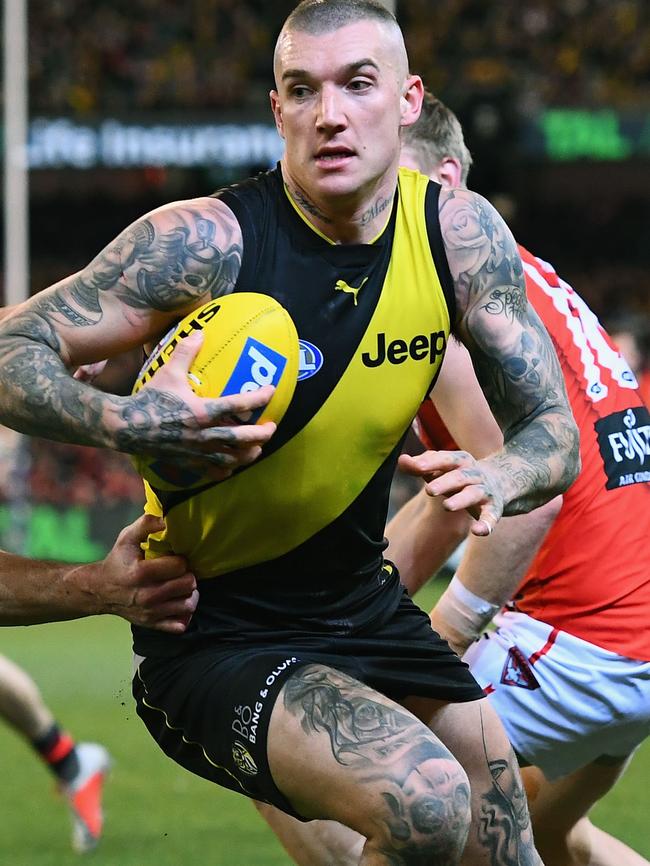 Richmond champion Dustin Martin avoids a tackle.