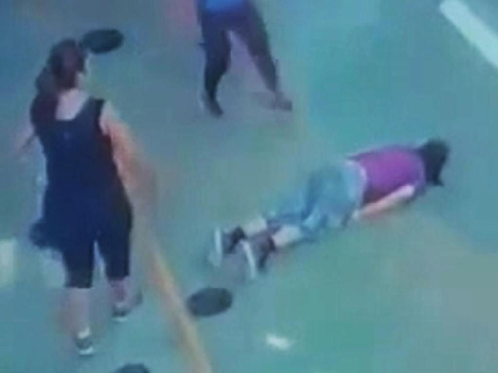 When she was seen suddenly dropping to the floor as others rushed to help. Picture: Twitter