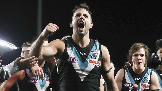 12/05/18 - AFL - Round 8, SHOWDOWN - Port Adelaide v Adelaide Crows at Adelaide Oval. Travis Boak leads his team down the race after the win. Picture SARAH REED