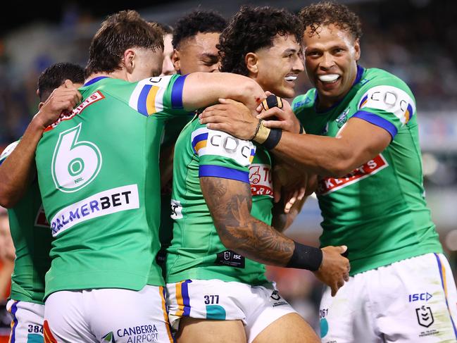 CANBERRA, AUSTRALIA - APRIL 07: Xavier Savage of the Raiders celebrates scoring a try with team mates during the round five NRL match between Canberra Raiders and Parramatta Eels at GIO Stadium, on April 07, 2024, in Canberra, Australia. (Photo by Mark Nolan/Getty Images)