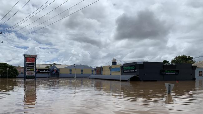 Flood water fills a shopping centre on Ballina Road on March 1, 2022, a day after Lismore was hit by a record flood. Picture: Stuart Cumming