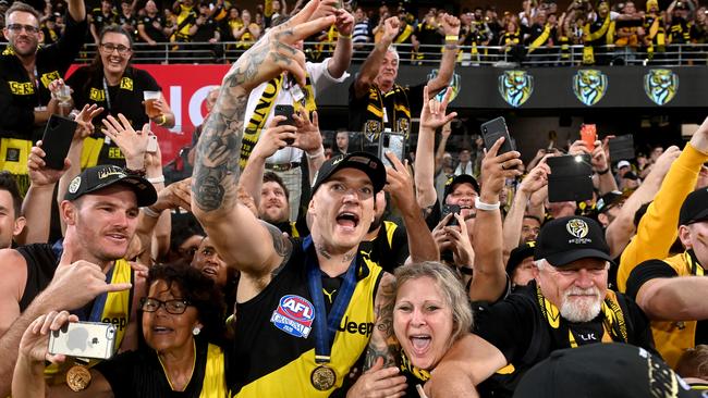 Dustin Martin celebrates with fans at the Gabba Grand Final. Picture: Getty Images