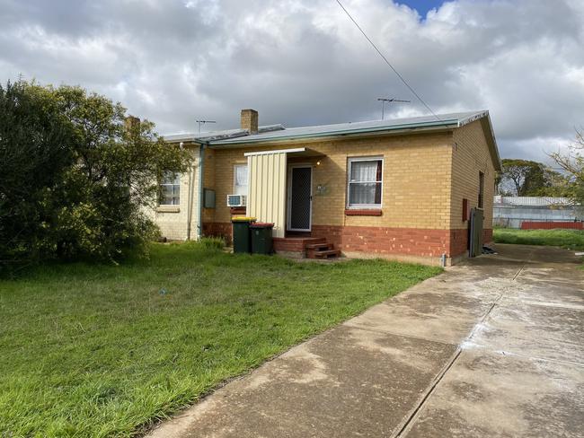 The alleged kidnapping victim was found in the boot of a Mitsubishi Magna at this Elizabeth Park home. Picture: Gabriel Polychronis