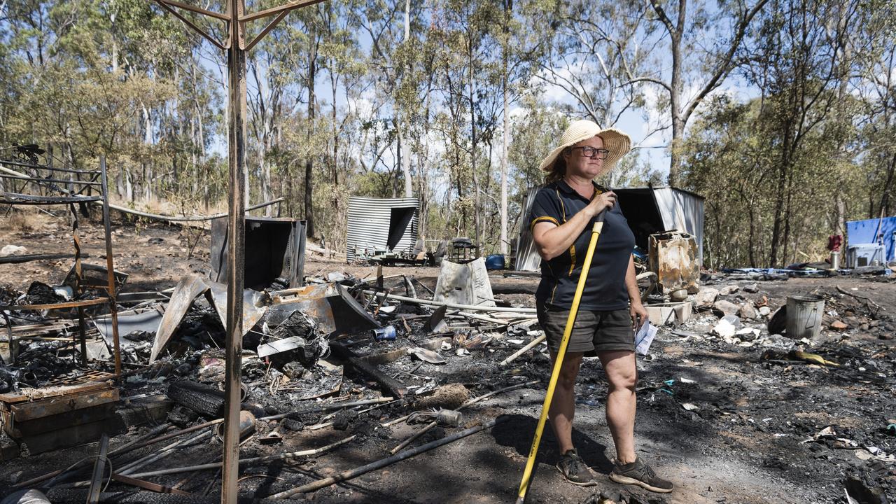 Murphy’s Creek Escape owner Alberta Western surveys the damage after a fire tore through a permanent caravan of a couple and another family at the bushland camp ground, Wednesday, September 27, 2023. Picture: Kevin Farmer