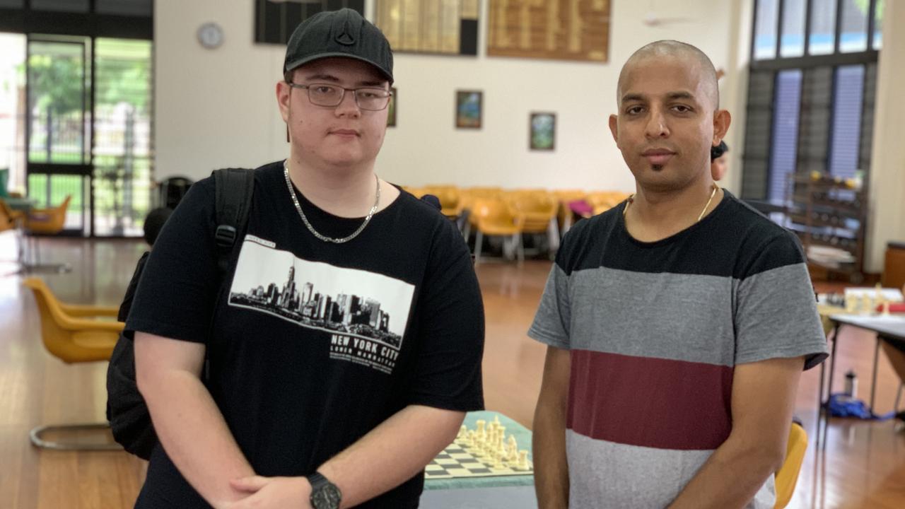 Dallas Mcgrath and Siju Joseph stand together after their match at the Mackay Chess Open on May 14. Picture: Duncan Evans