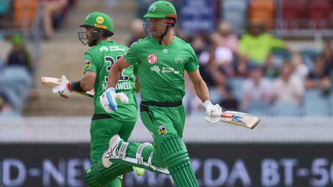 Marcus Stoinis, right, and Glenn Maxwell of the Melbourne Stars run between wickets during the Big Bash League match against Sydney Thunder at Manuka Oval, on Saturday. Picture: Getty Images