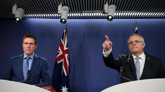 Prime Minister Scott Morrison and Attorney general Christian Porter (left) address media in Sydney, Thursday, December 13, 2018. The Prime Minister says Australia needs a dedicated new law that makes religious discrimination illegal, in order to protect freedom. (AAP Image/Dan Himbrechts) NO ARCHIVING