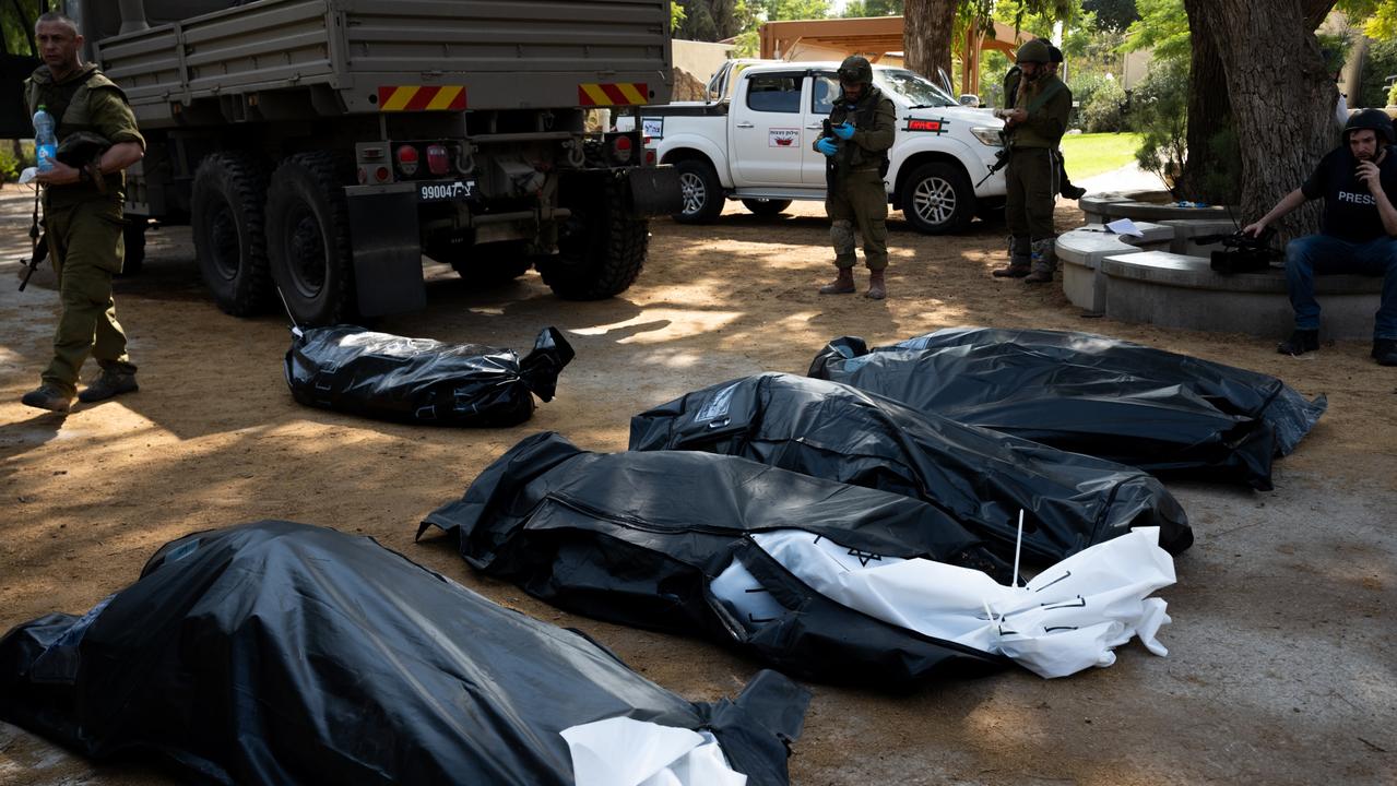 Four bodies of Israeli civilians killed in Kfar Aza. Picture: Alexi J. Rosenfeld/Getty Images