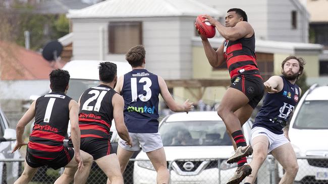 Lauderdale Toutai Havea marks during a game against Launceston at Lauderdale. Picture: Chris Kidd