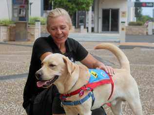 Southern Queensland Correctional Centre's Jane with Assistance Dogs Australia's Pups in Prison Program pooch Hoover during an outing in Gatton. Picture: Donna Marchiori