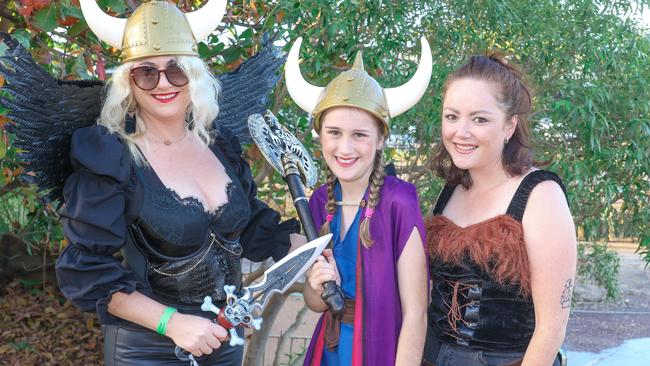 Claire Wylie, Annalise Wylie and Jarnie Hardaker at the annual Dinah Beach Yacht Club’s Viking Funeral. Picture: Glenn Campbell