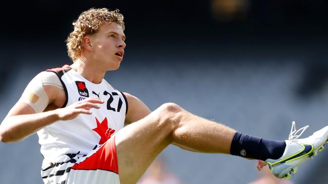 Jed Walter of the Team Houli Squad kicks the ball during the 2022 AFL Futures match between Team Houli and Team Murphy at the Melbourne Cricket Ground on September 24, 2022 in Melbourne, Australia. (Photo by Dylan Burns/AFL Photos via Getty Images)