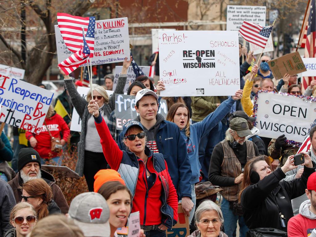 People protest against the coronavirus shutdown in front of the State Capitol in Madison, Wisconsin. Picture: Kamil Krzaczynski